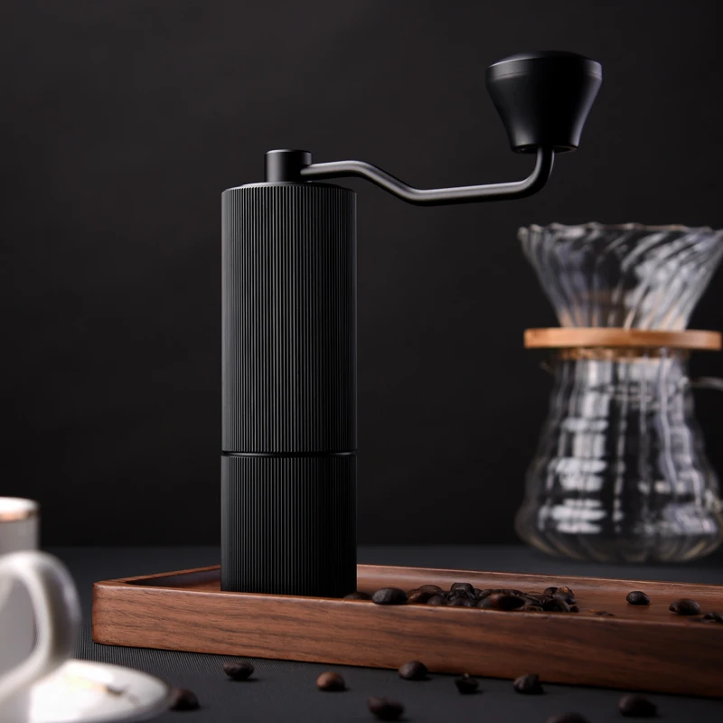 Manual espresso grinder with precise adjustment mechanism for dialing in perfect grind size