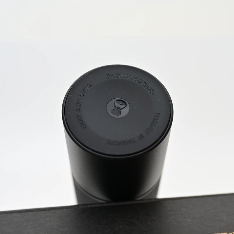 Compact manual grinder with foldable handle ideal for AeroPress travel